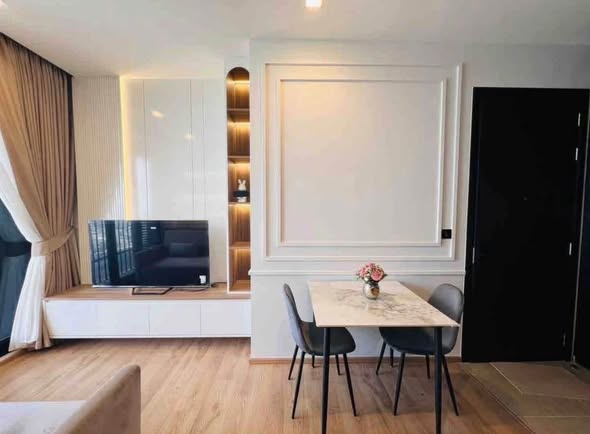 living room and bedroom of Noble Around Ari