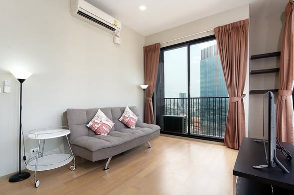 bedroom and living room of Noble Reveal