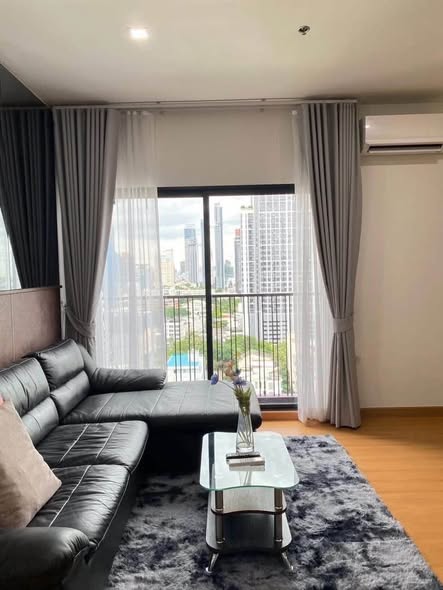 bedroom and living room of Noble Reveal