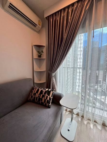 bedroom and living room of Noble Revolve Ratchada 1