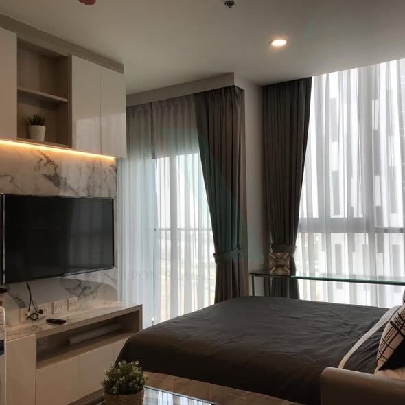 living room and bedroom of Noble Revolve Ratchada 1