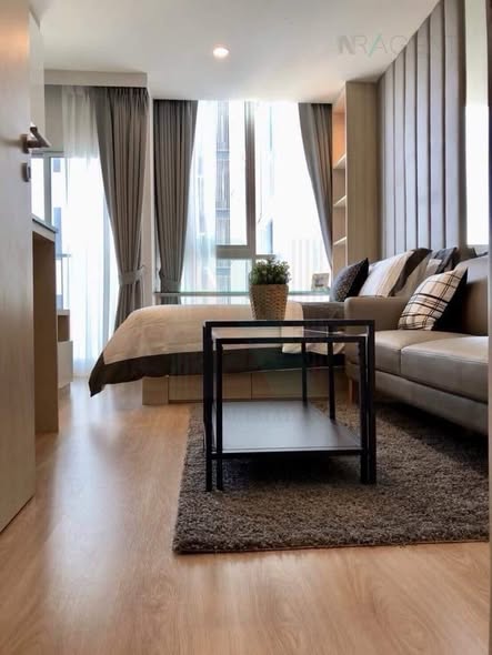 living room and bedroom of Noble Revolve Ratchada 1