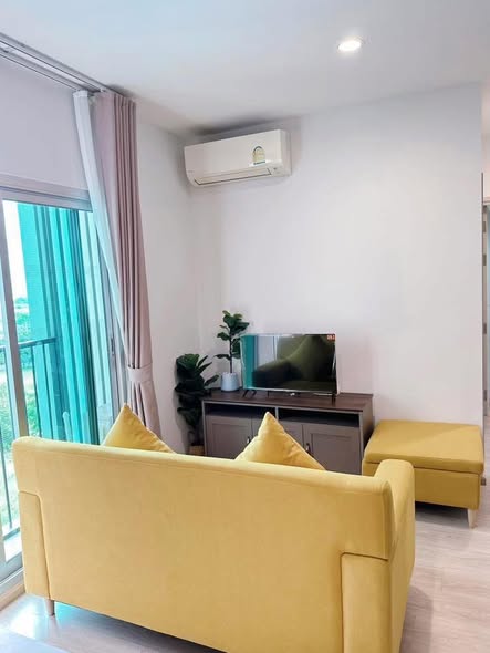 bedroom and living room of Noble Revolve Ratchada 2