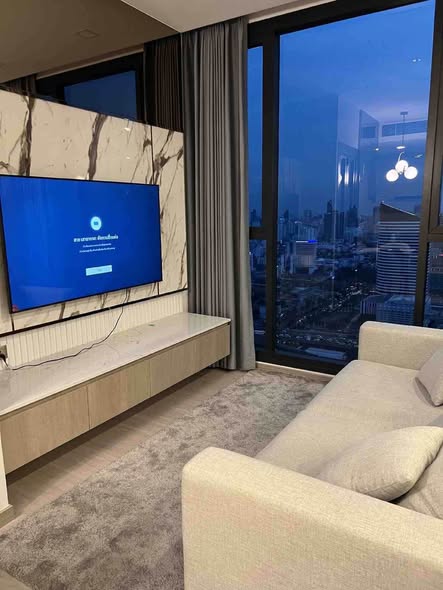 bedroom and living room of One9Five Asoke – Rama 9