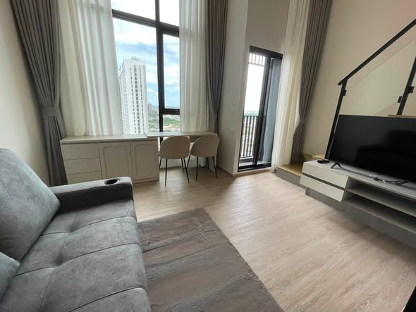 bedroom and living room of Origin Plug & Play Nonthaburi Station