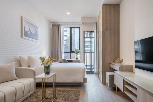 living room and bedroom of Park​ Origin​ Phaya Thai