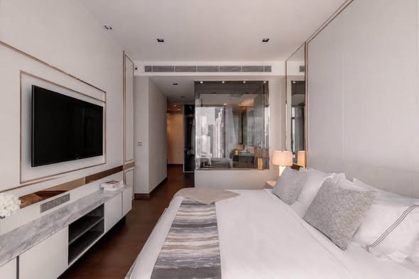 bedroom and living room of Q1 Sukhumvit Condo by Q House