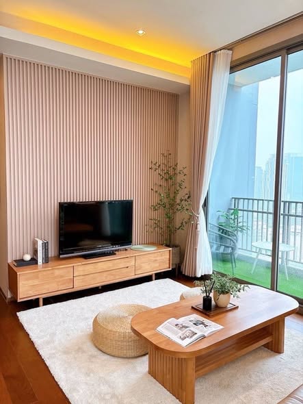 bedroom and living room of Quattro by Sansiri