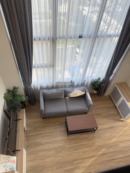 living room of Ramada Plaza by Wyndham Bangkok Sukhumvit 48