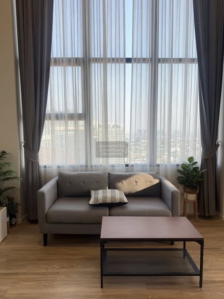 living room of Ramada Plaza by Wyndham Bangkok Sukhumvit 48