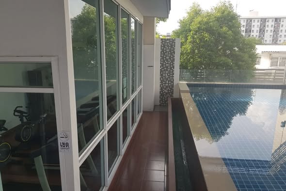 pool and room interior of Regent Home Condo 9 Sukhumvit 64