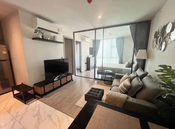 living room and bedroom of RHYTHM Ekkamai