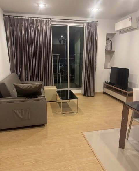 bedroom and living room of RHYTHM Phahon-Ari