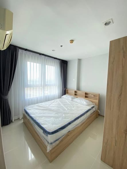 bedroom of Rich Park Chao Phraya