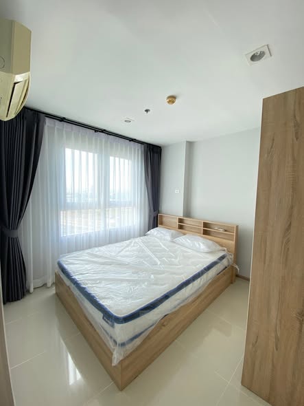 bedroom of Rich Park Chao Phraya