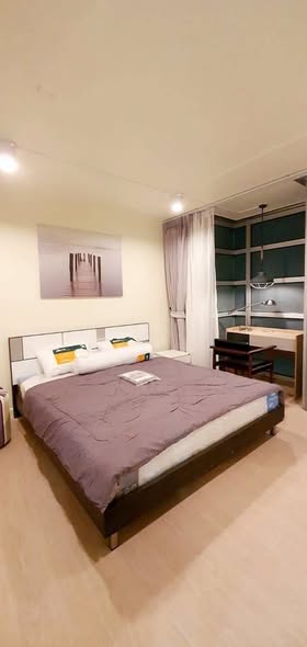 bedroom and room interior of Riviera Condominium