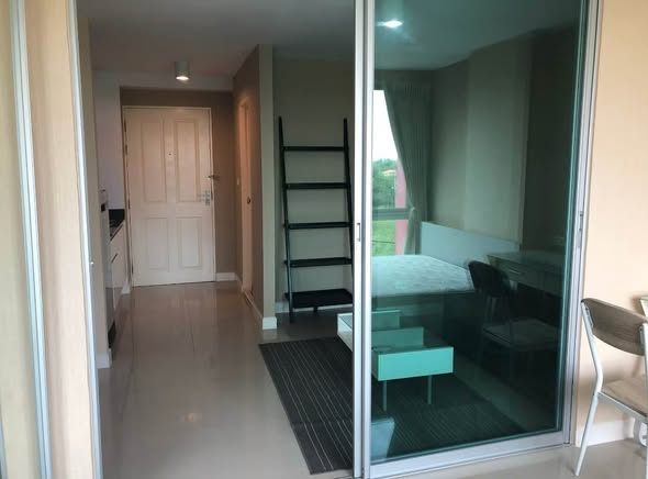 bedroom and room interior of Swift Condo