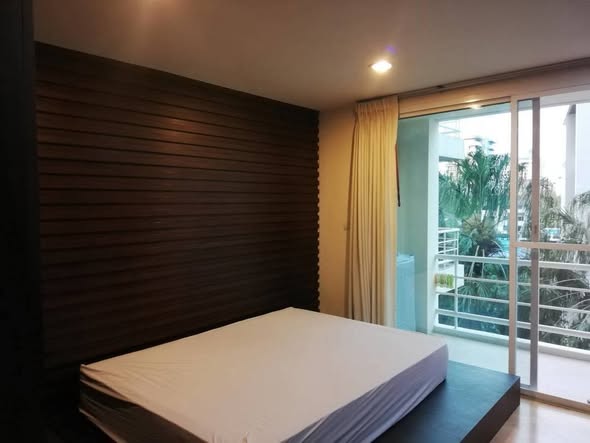 bedroom of The Amethyst 39 Condominium