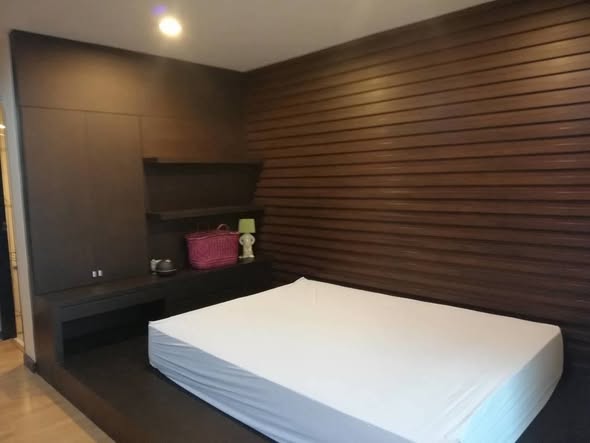 bedroom of The Amethyst 39 Condominium