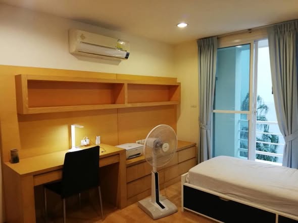 bedroom of The Amethyst 39 Condominium