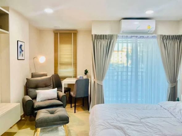 bedroom of The Astra Condo