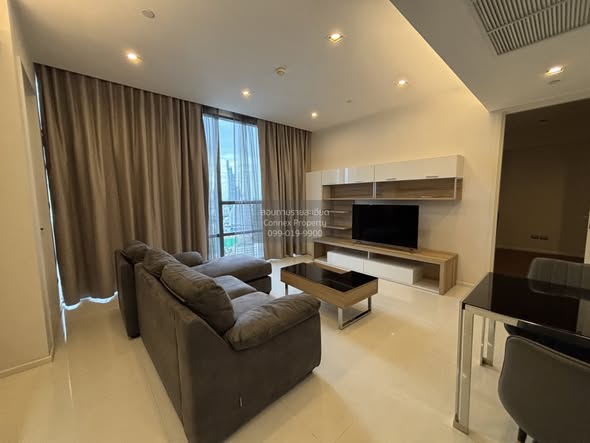 bedroom and living room of The Bangkok Sathorn