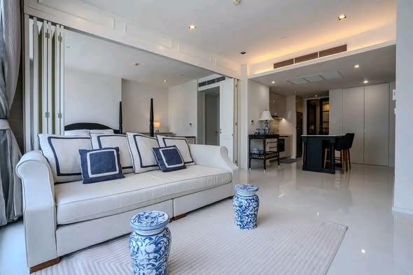 bedroom and living room of The Bangkok Sathorn