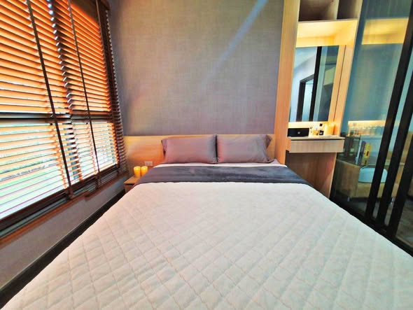 bedroom of THE BASE Park West – Sukhumvit 77