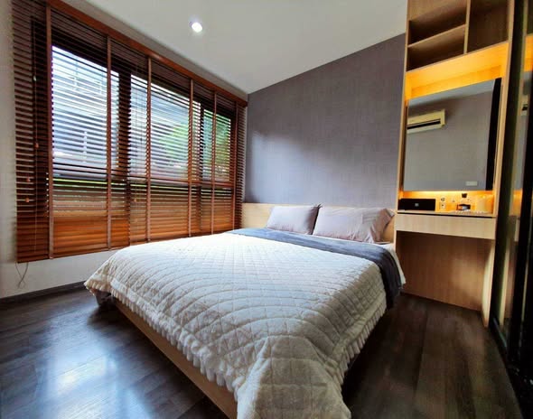 bedroom and room interior of THE BASE Park West – Sukhumvit 77