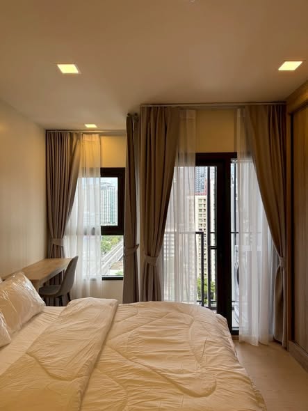 bedroom of The Base Urban Rama9