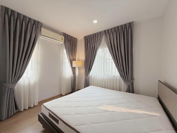 bedroom of The City Ramintra