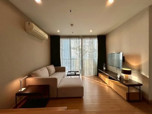 living room and bedroom of The Complete Narathiwas