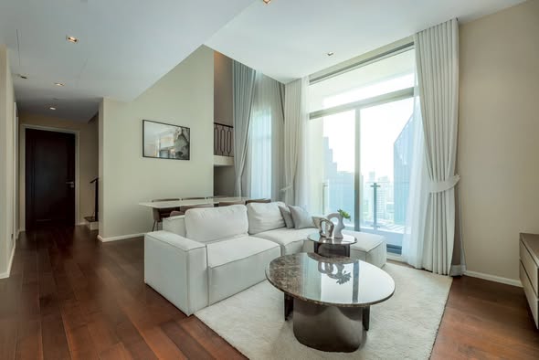bedroom and living room of The Diplomat 39