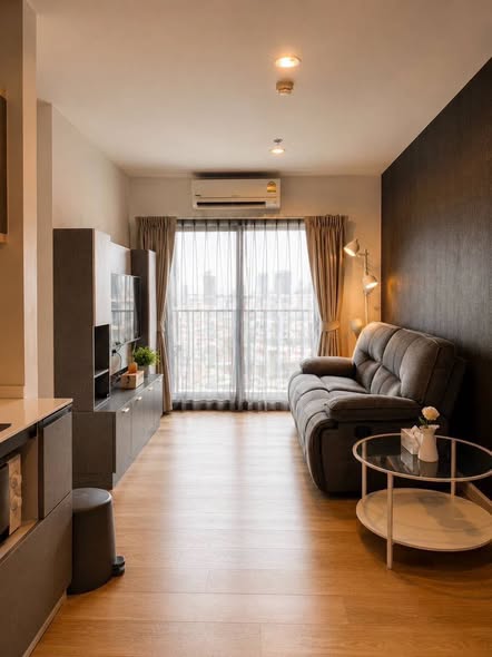 bedroom and living room of The Key Sathon-Charoen Rat