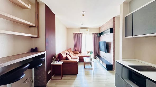 living room and bedroom of The Key Sathon-Charoen Rat