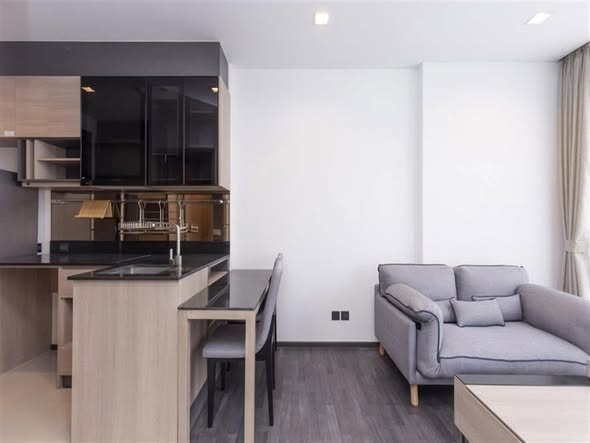 living room and kitchen of THE LINE Asoke-Ratchada