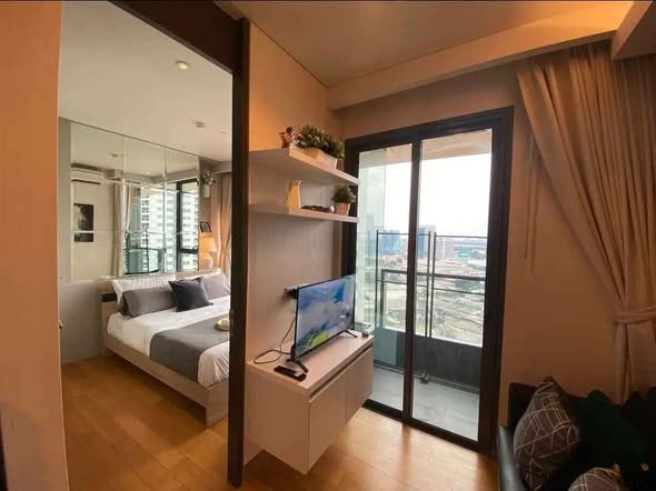 bedroom of The Lumpini 24