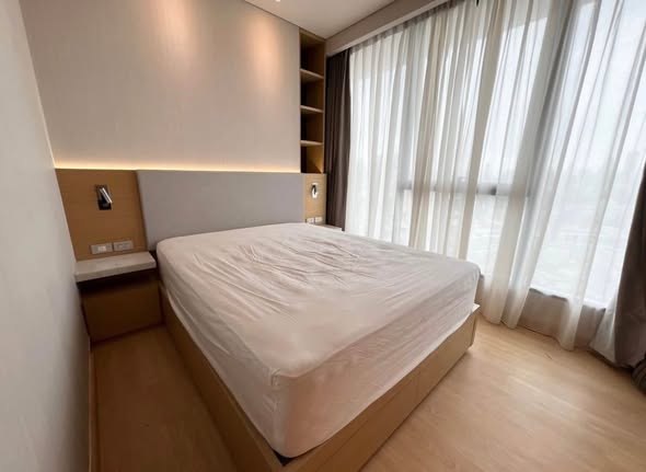 bedroom of The Lumpini 24