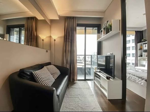 bedroom and living room of The Lumpini 24