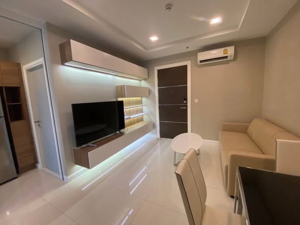 bedroom of The Metropolis Samrong