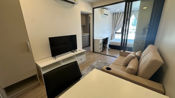 bedroom and living room of The Nest Chula-Samyan
