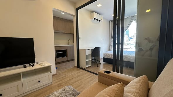 bedroom and living room of The Nest Chula-Samyan