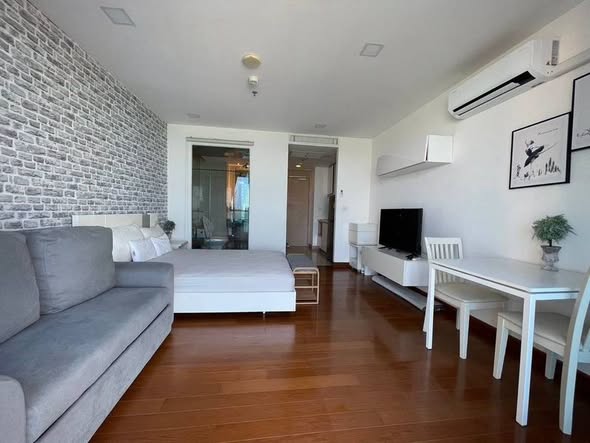 living room and bedroom of The Palm Wongamat Beach Pattaya