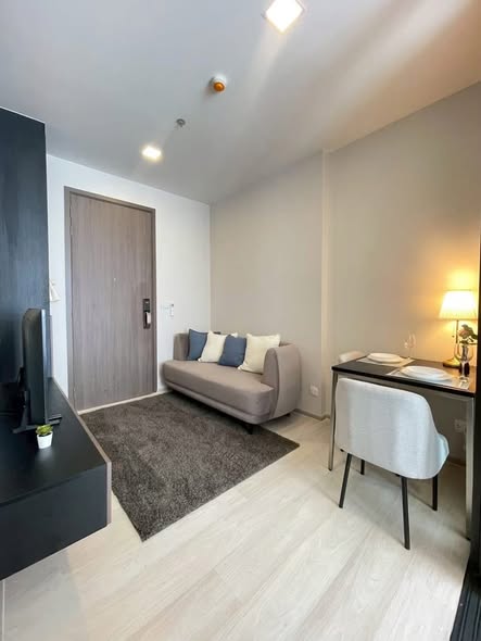 bedroom and living room of The Privacy Jatujak