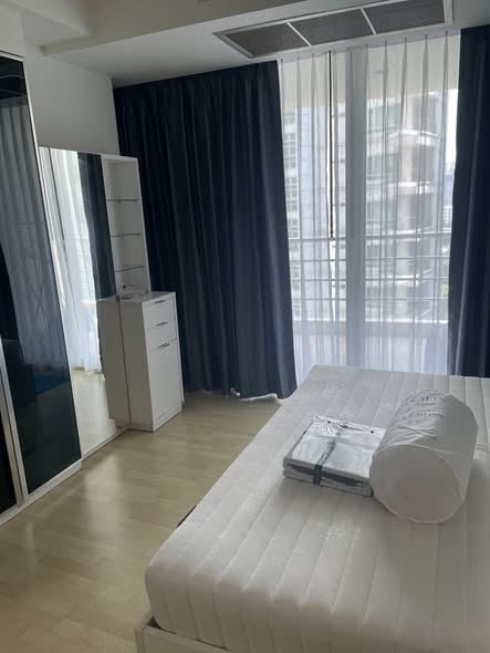 bedroom of The Rajdamri Serviced Residence