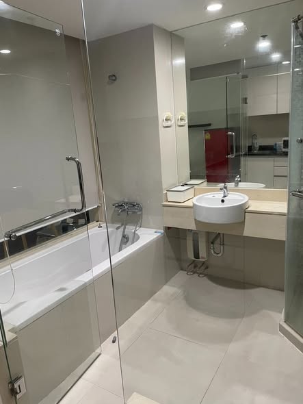 room interior and bathroom of The Rajdamri Serviced Residence