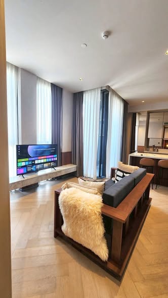 living room and bedroom of The Reserve Sathorn