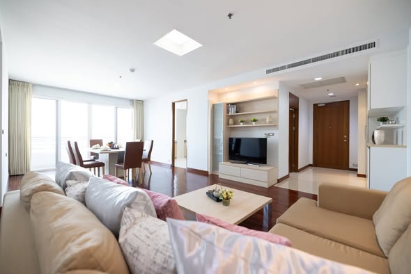 living room and bedroom of The Residence