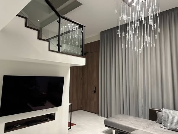 living room of The Roof Townhome