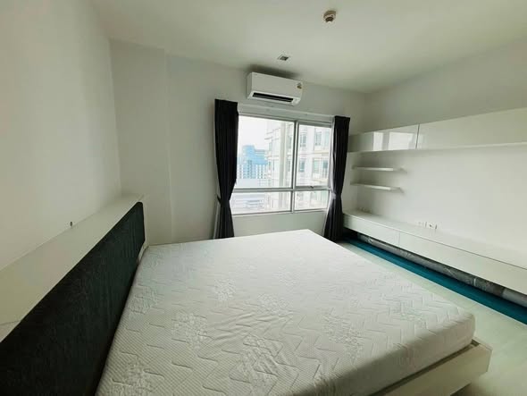 bedroom of The Room Ratchada-Ladprao